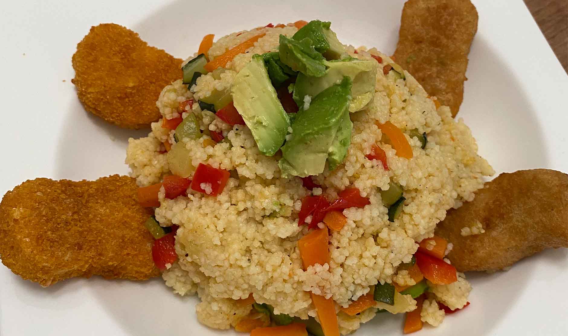 Gemüse Couscous mit Chicken Nuggets